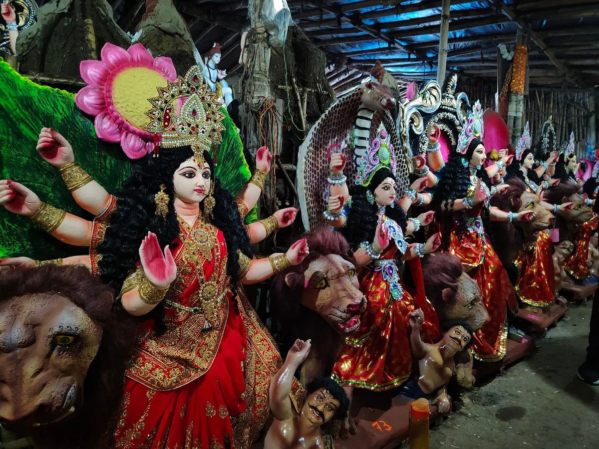 Colourful clay idols of Goddess Durga on her lion prepared for Navratri