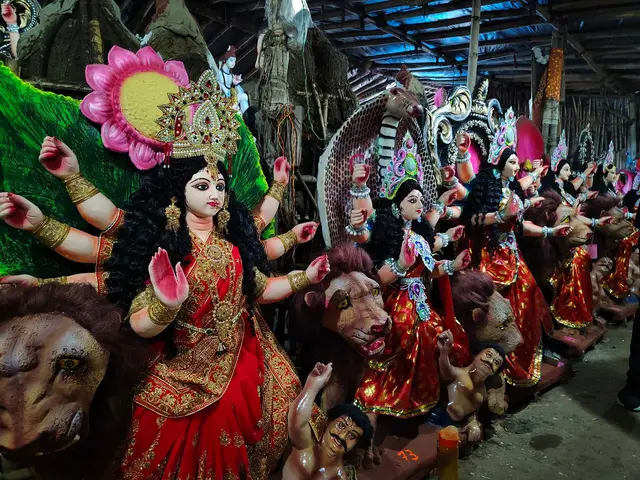 Colourful clay idols of Goddess Durga on her lion prepared for Navratri