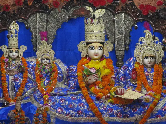 Crowned idols of Shri Ram and Sita with marigold garlands at Kanak Bhavan, Ayodhya