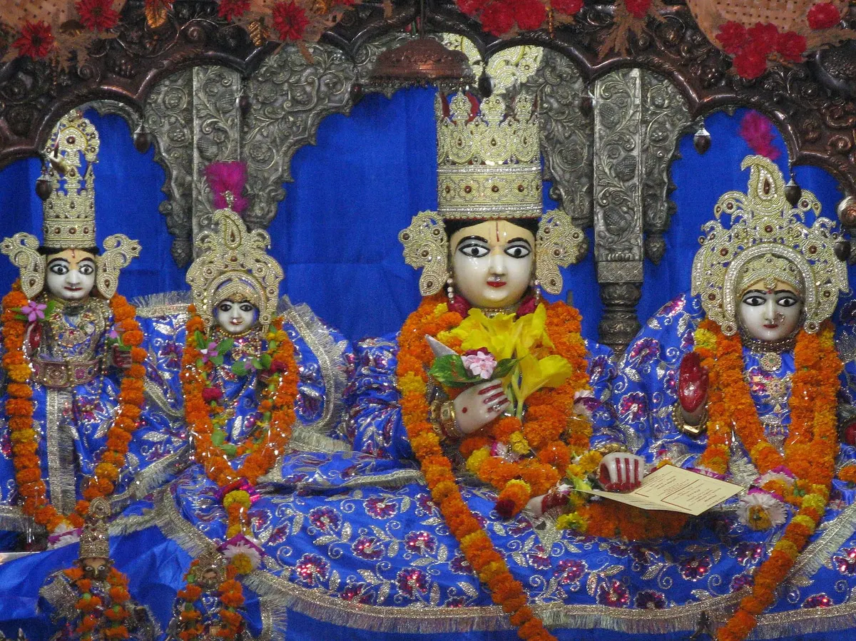 Crowned idols of Shri Ram and Sita with marigold garlands at Kanak Bhavan, Ayodhya